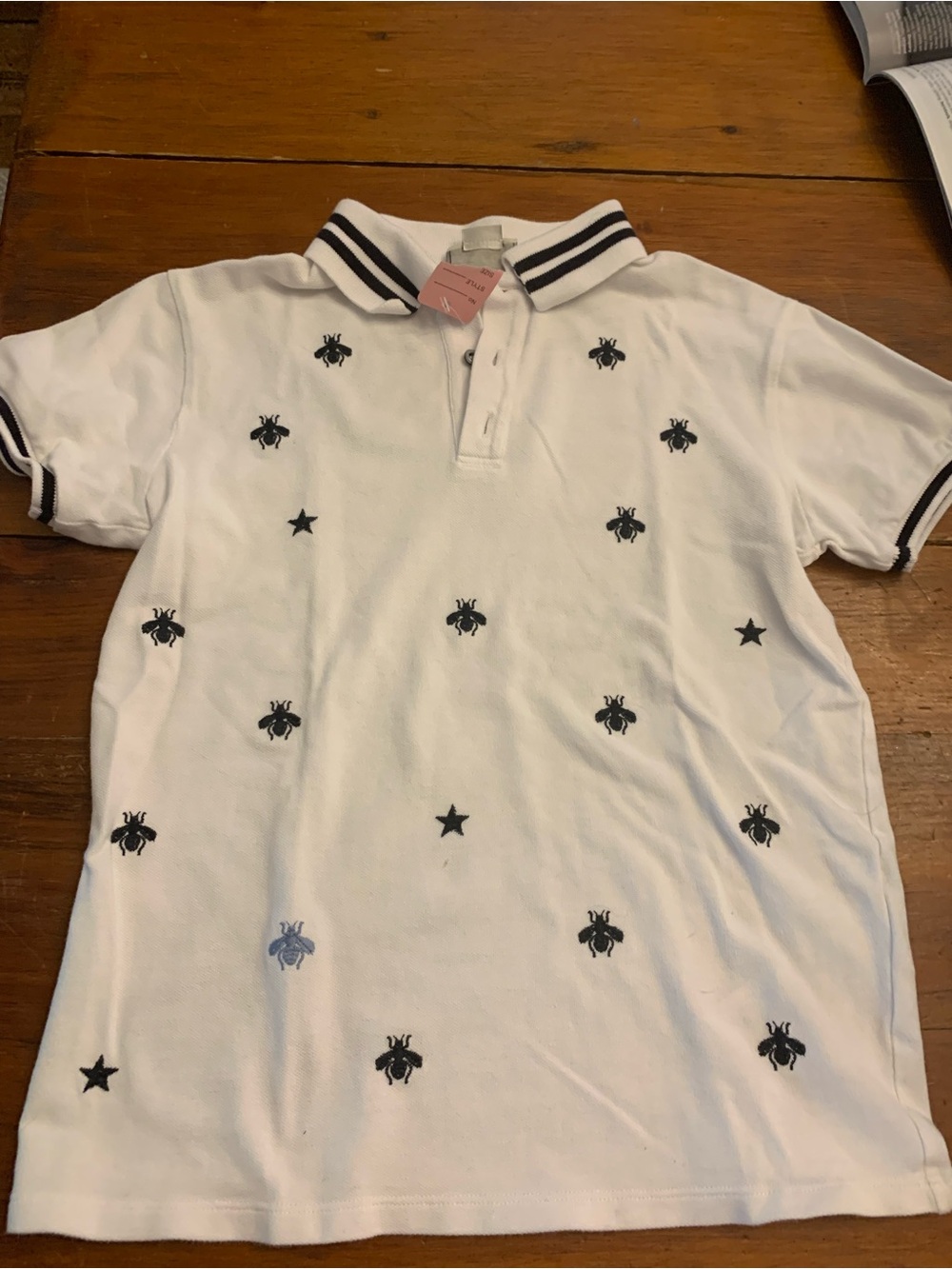 Child’s Gucci White Polo with Black Bee & Star Embroidery